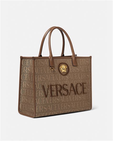 versace bag collection 2015|versace handbags with big zipper.